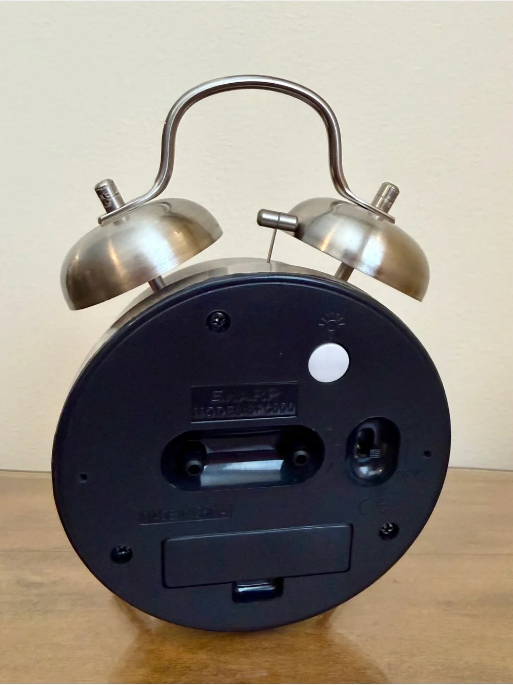 Sharp Twin Bell Alarm Clock in a silver brushed metal finish